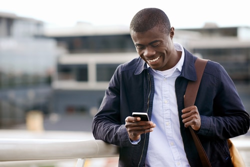 Man looking at his cell phone