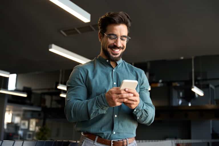 Businessman with looking at his phone